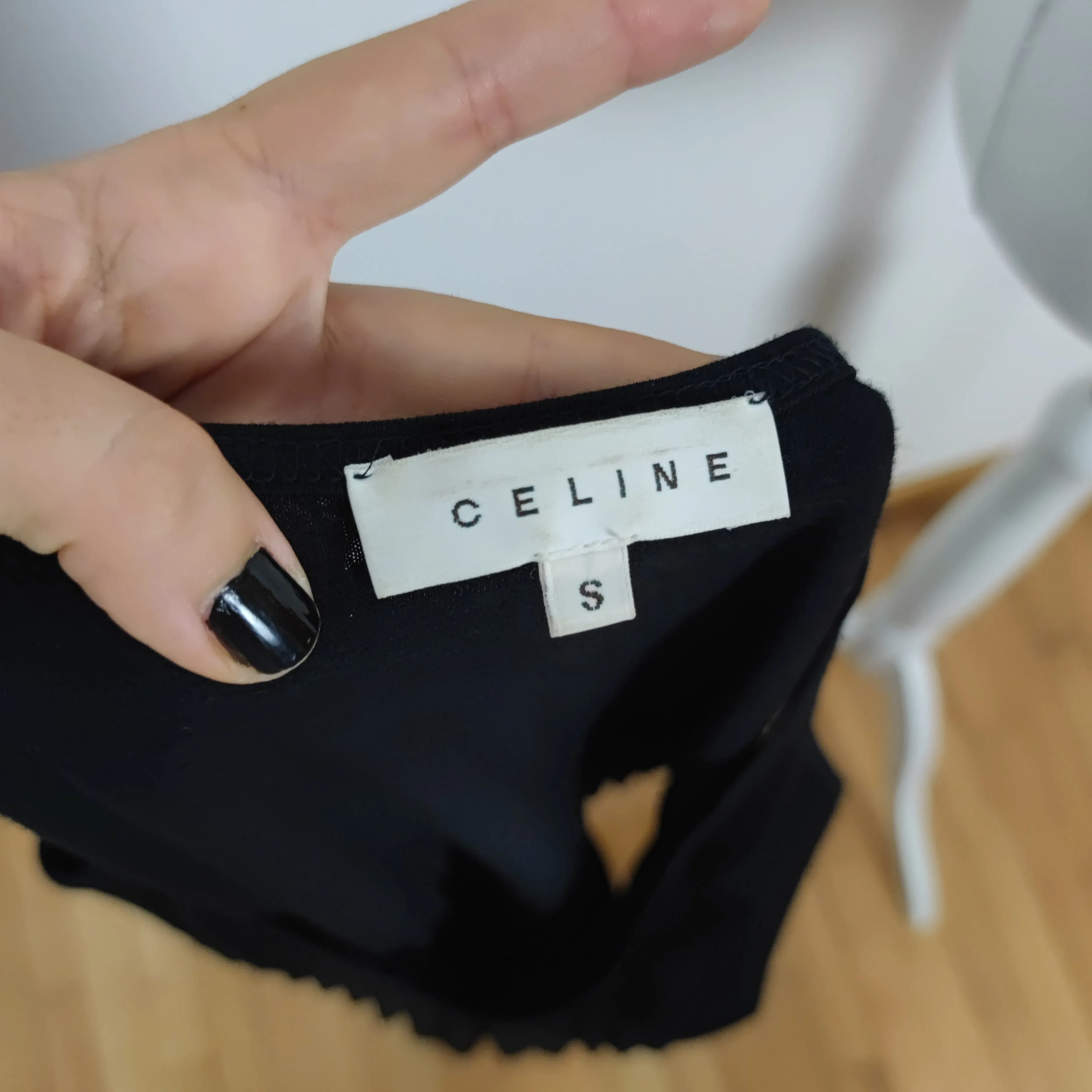 abito Céline nero con gonna plissé