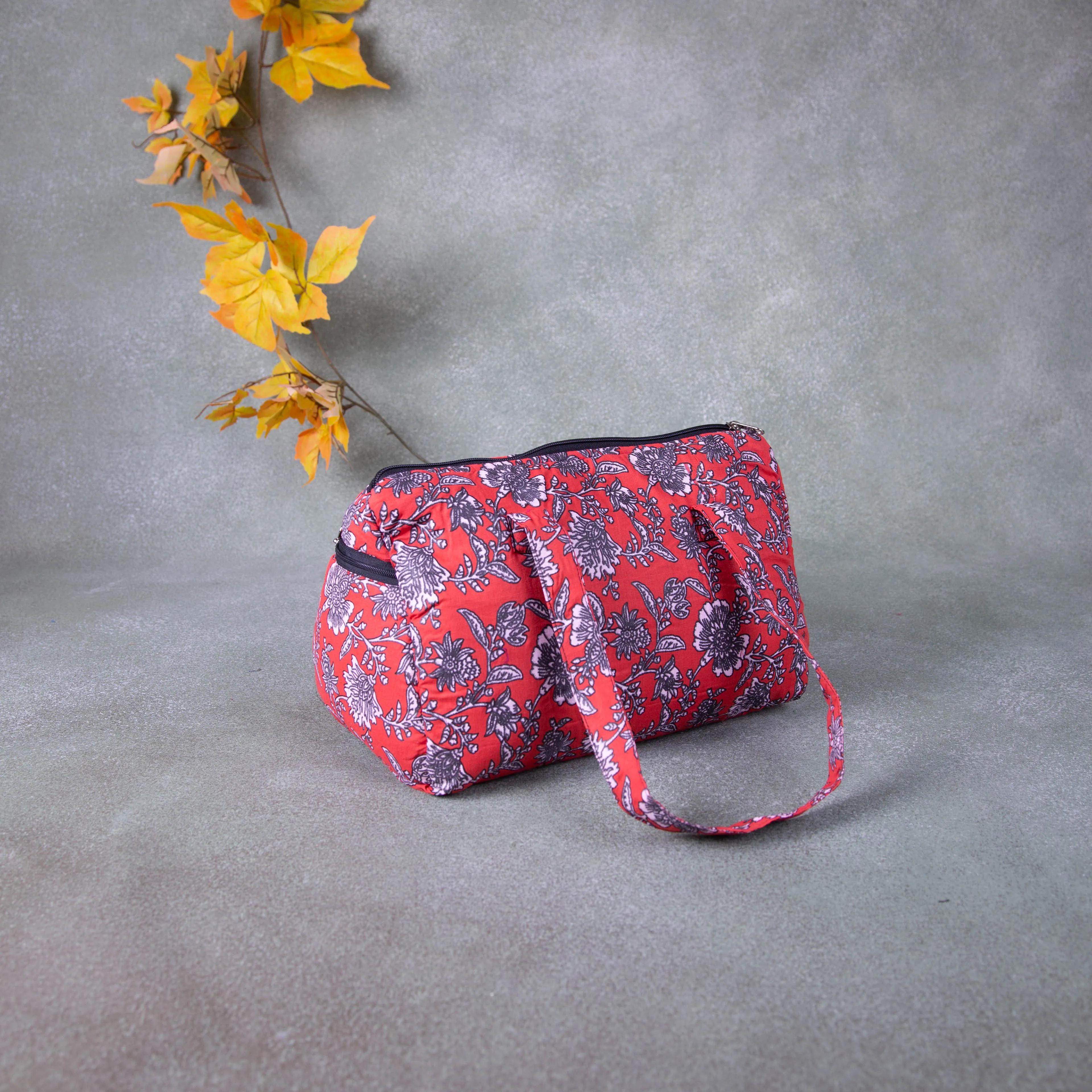 Barrel Handbags Red with Grey Flower Design.