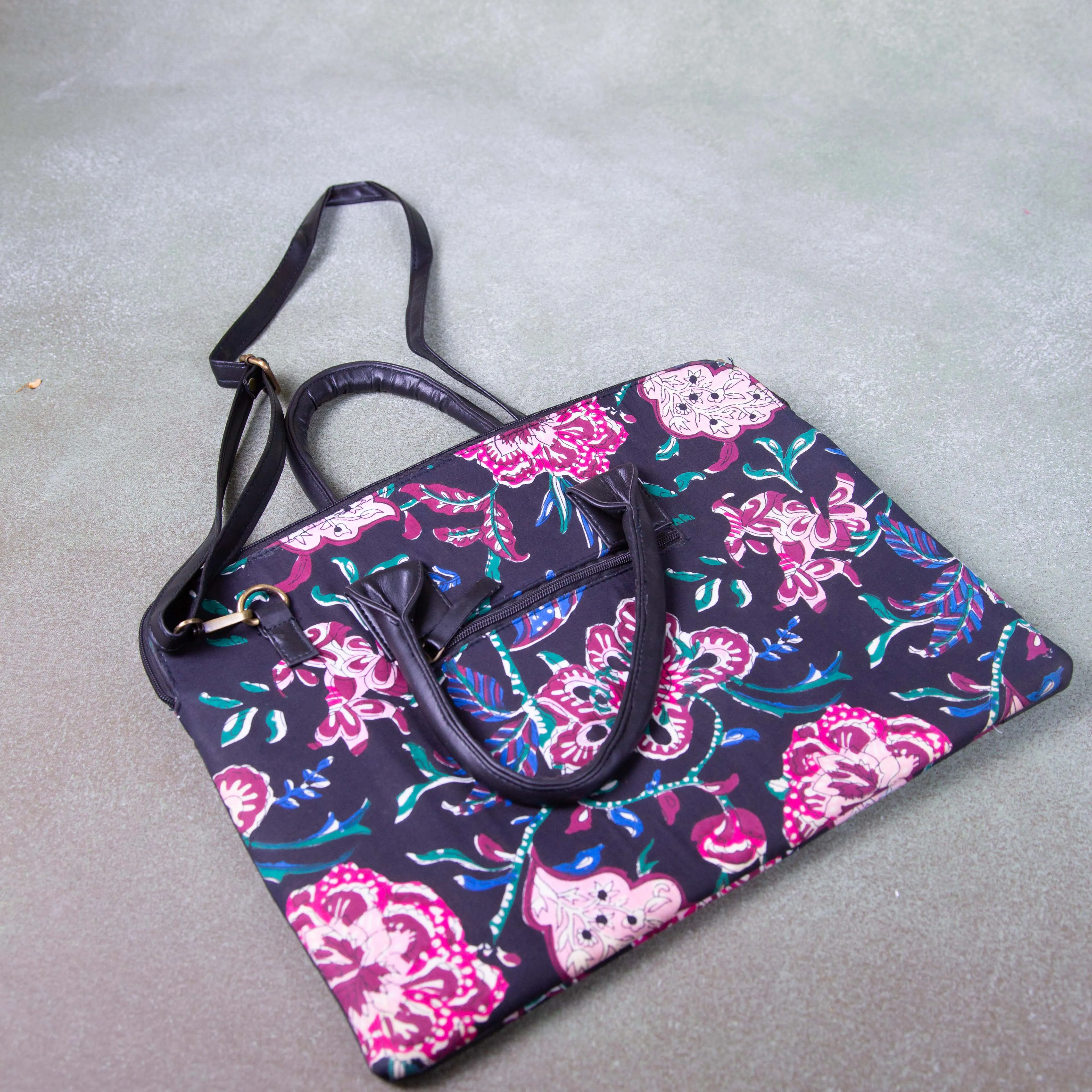 Laptop Sleeve Black with Pink Flower Design.